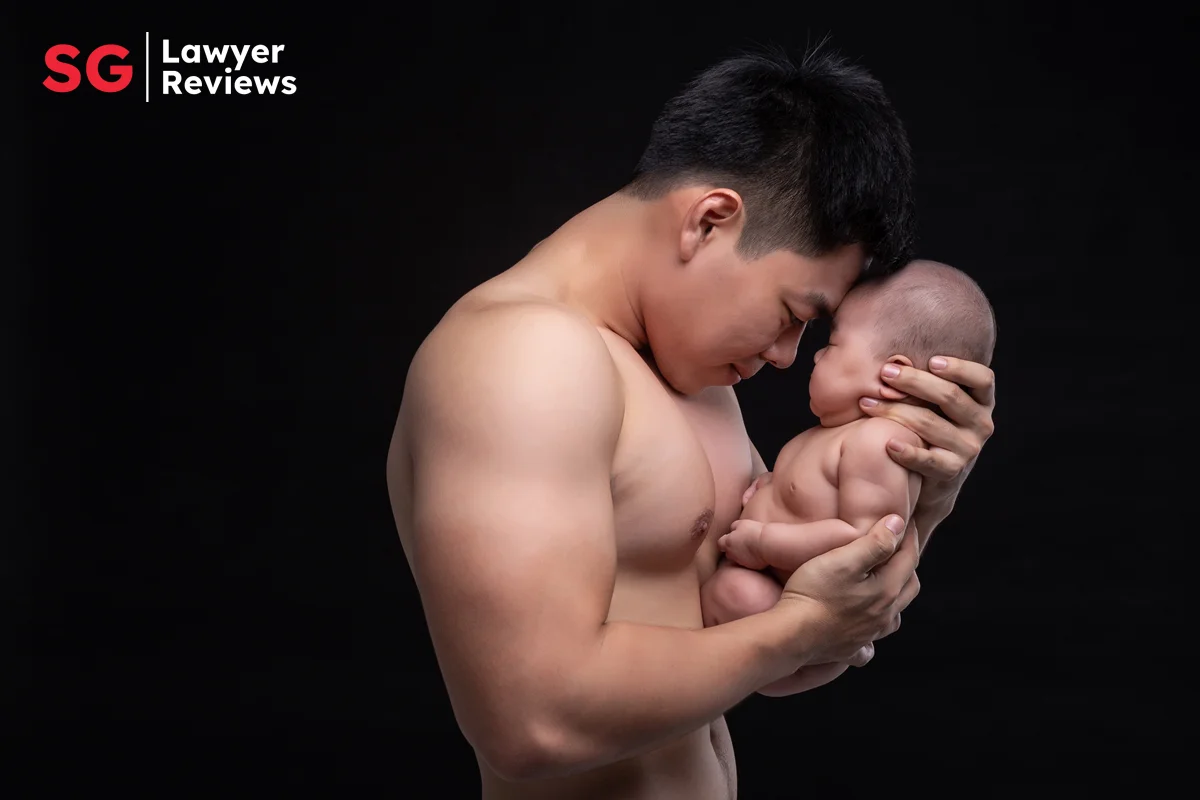 Singaporean Father Holding Newly Born Baby Mandatory Paternity Leave: Singapore Fathers Now Get 4 Weeks by Law